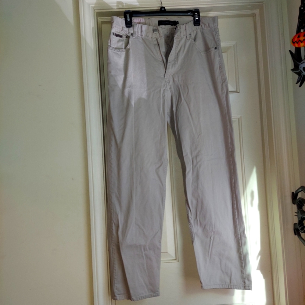 NWOT Calvin Klein Jeans, Khaki Beige Tan Color. New Condition, Size 34.